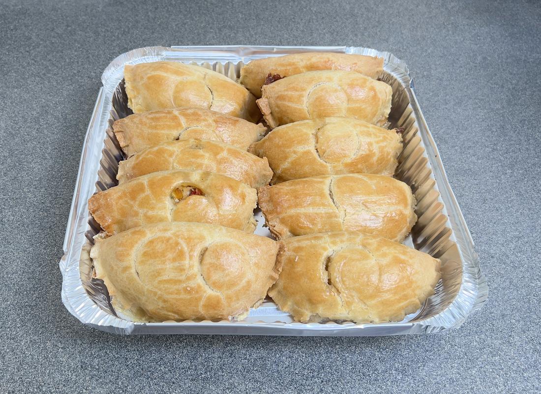 Rows of individually boxed pastries ready for delivery
