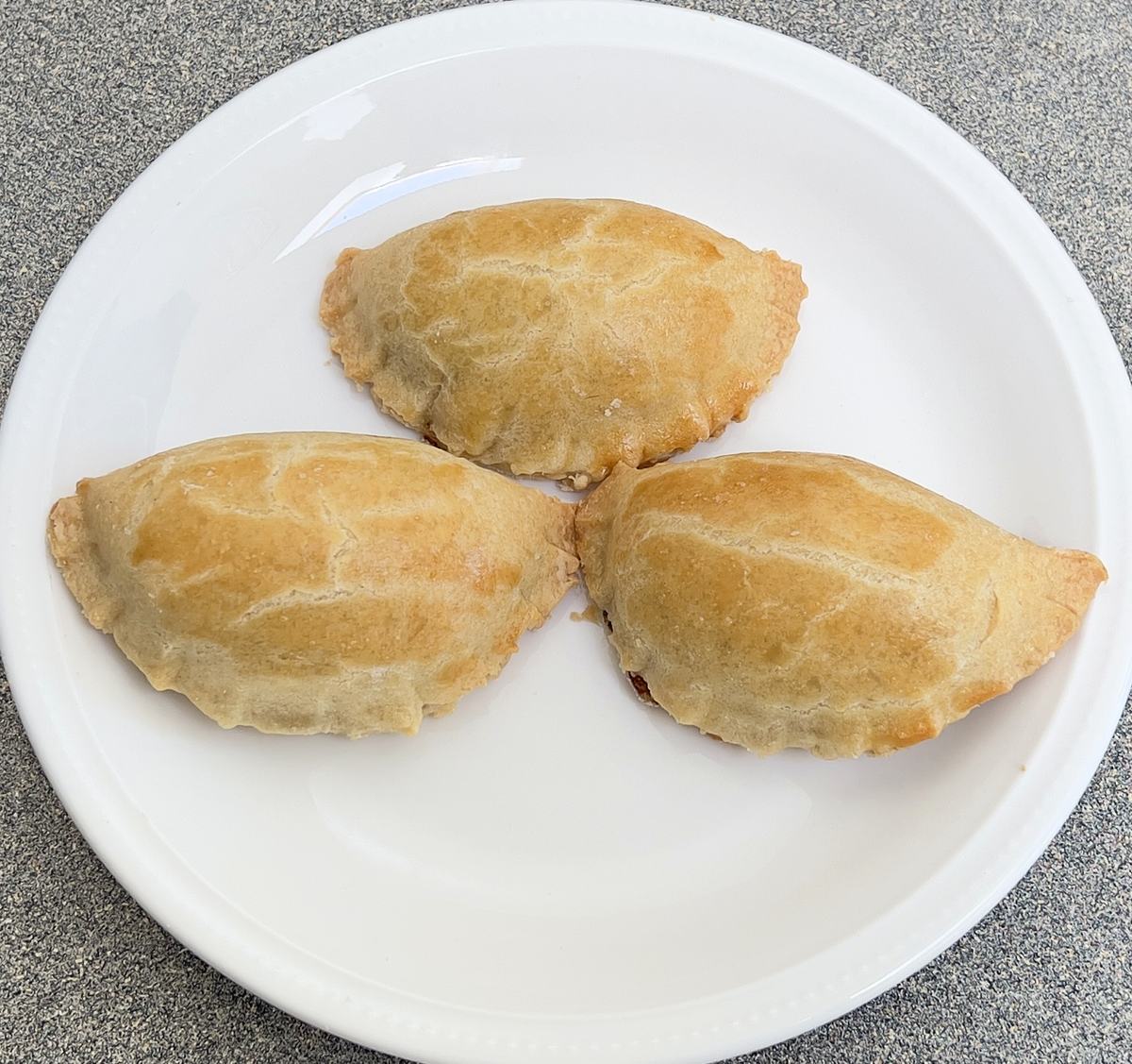 Freshly baked meat pies from Destiny Pastries Services